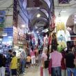 Ans met koopman in de Grote Bazaar van Istanboel. Kijke, kijke, nie kope!