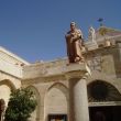Geboortekerk Bethlehem. De kloosterfof met de sinaasappelbomen en het beeld van St Hiëronymus