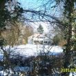 Ons huis in Deil en de tuin in de laatste winter