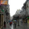 Verregende winkelstraat in Gijón (en een nieuwe paraplu)